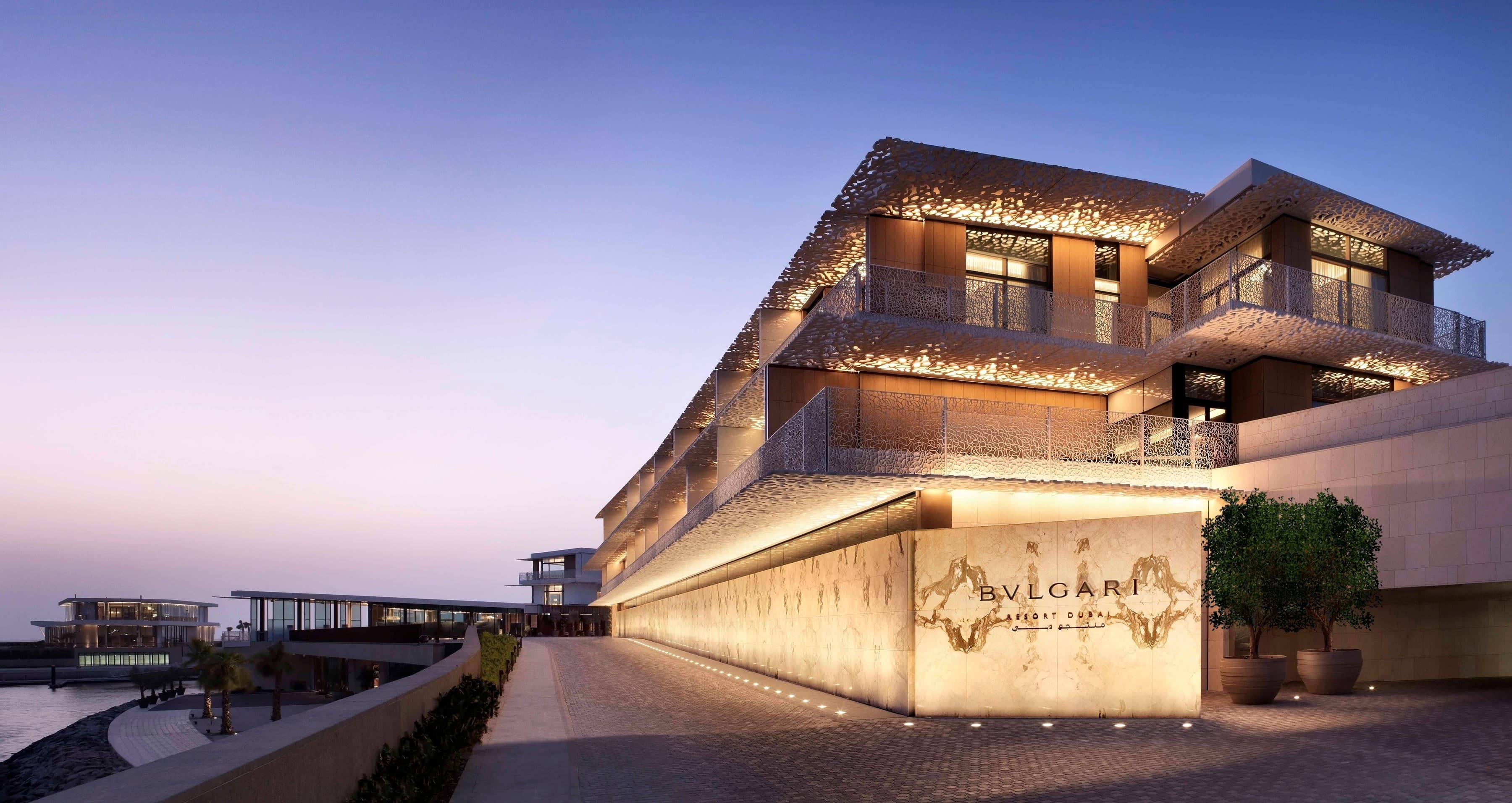 Resort entrance and facade at dusk