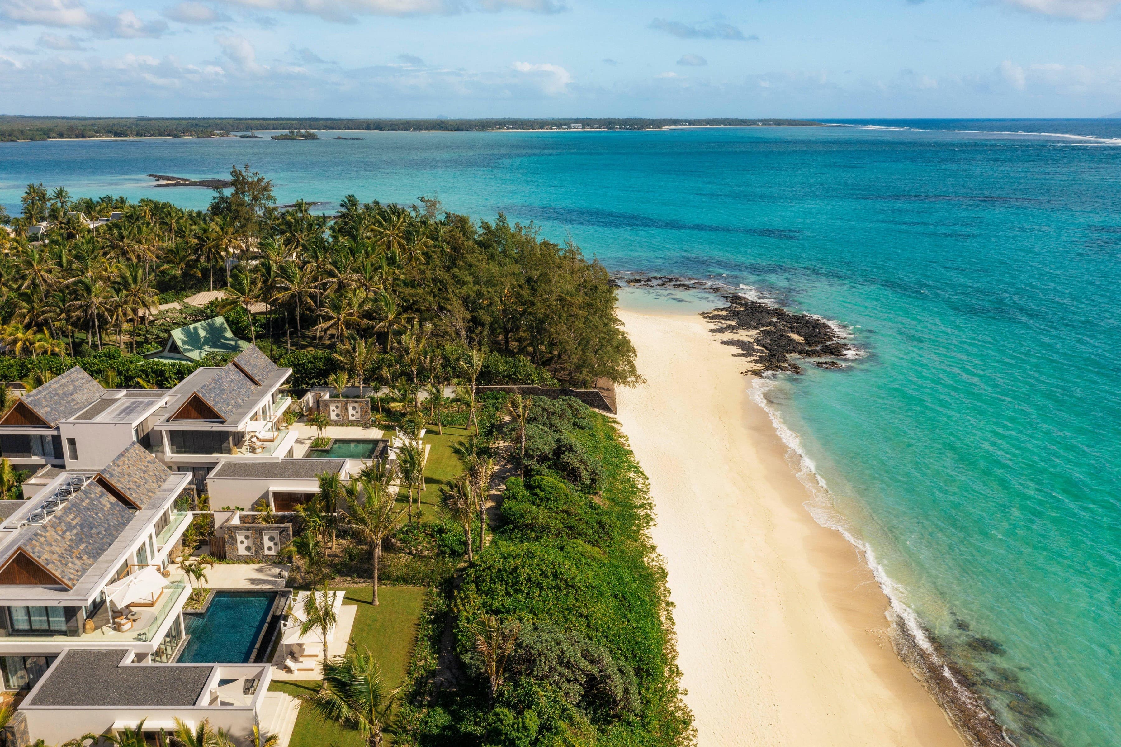 Aerial of the private homes and beach, Le Saint Geran