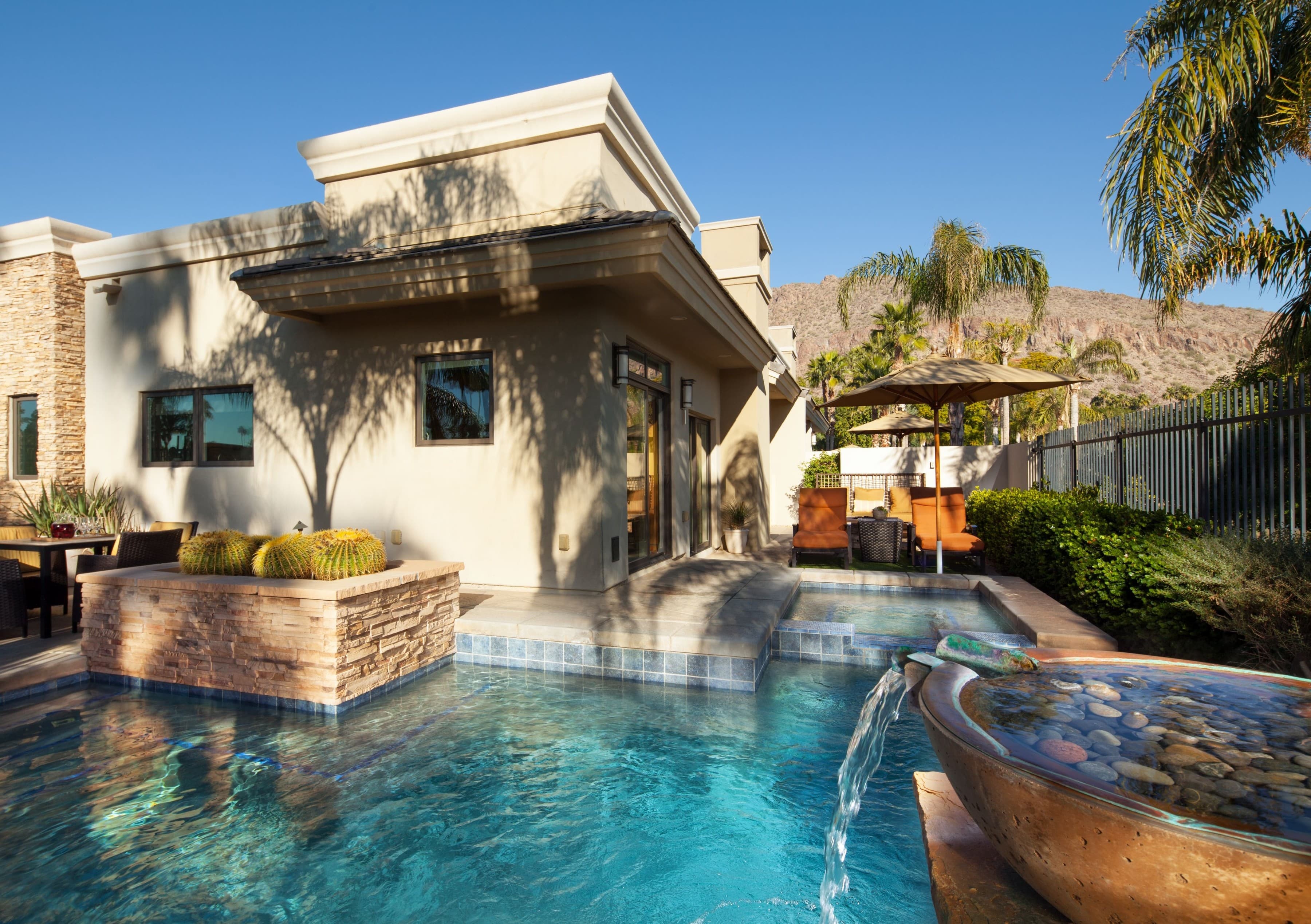 Residence exterior with private plunge pool, Camelback Mountain behind