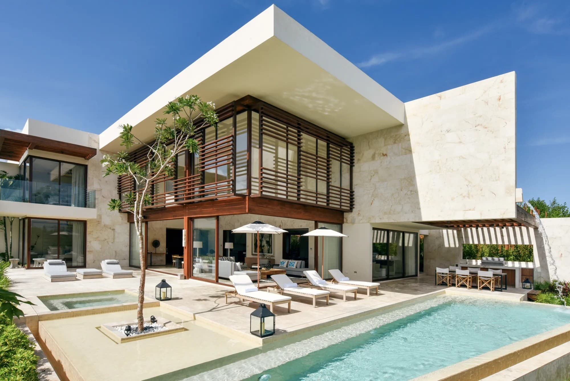 Four-bedroom residence exterior with pool terrace