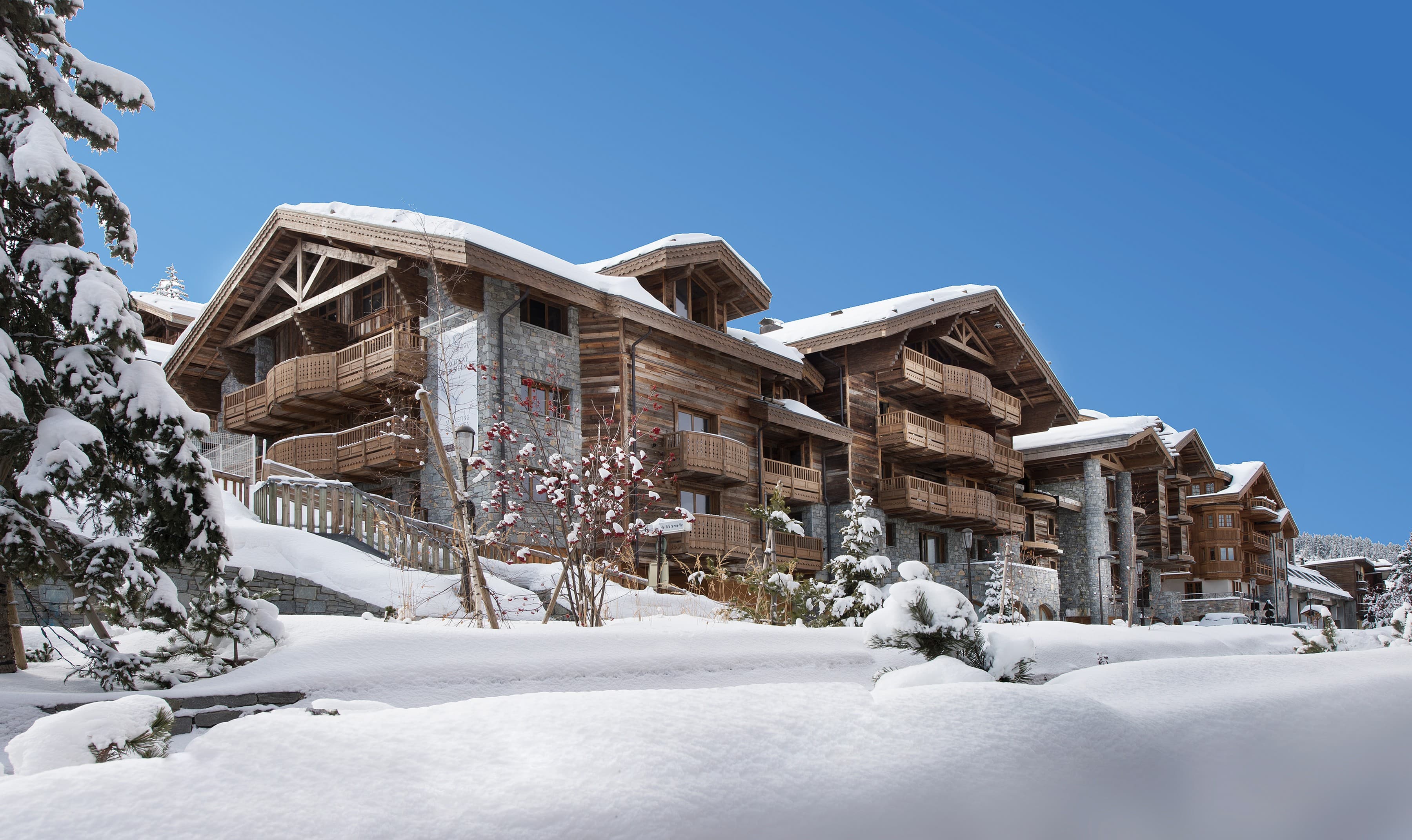 Residence buildings under snow, Courchevel 1850