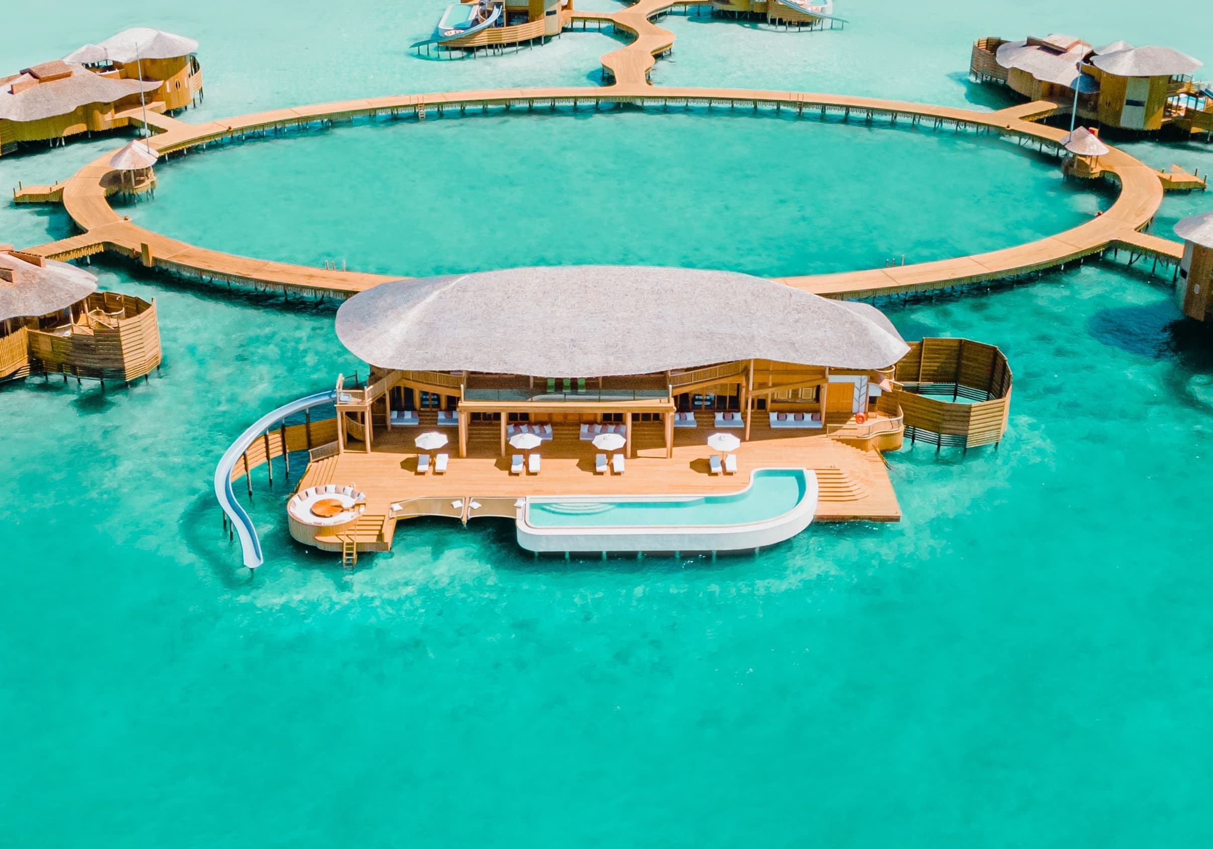 Over-water residence with pool and slide, Soneva Jani